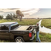 Roll-N-Lock Tonneau Cover Soft Manual Retractable Black Vinyl Adhered To Interlocking Aluminum Panels - LG262M