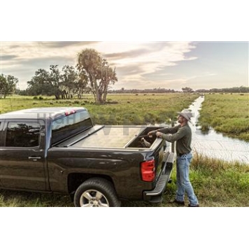 Roll-N-Lock Tonneau Cover Soft Manual Retractable Black Vinyl Adhered To Interlocking Aluminum Panels - LG262M